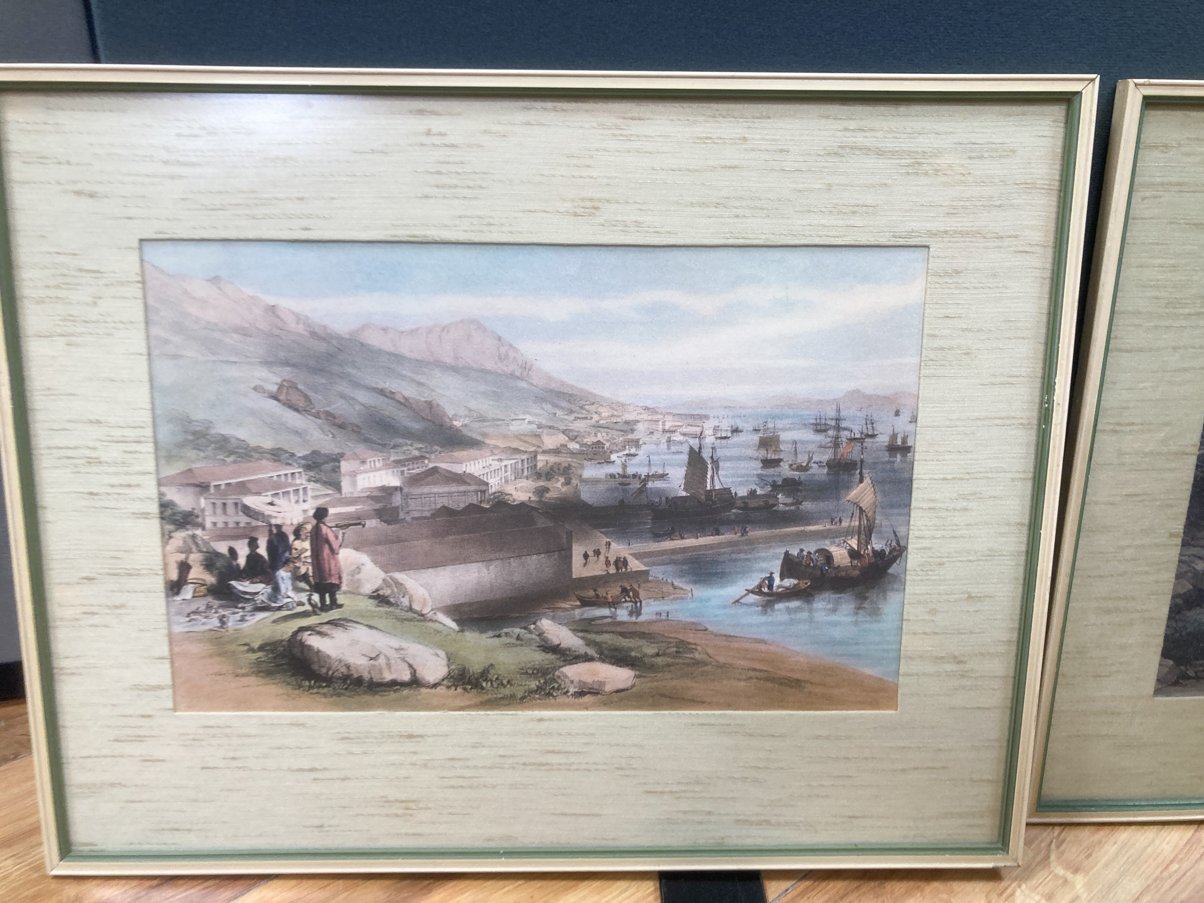 Four coloured prints of Hong Kong and Kowloon, 21.5 x 33 with glazed frames